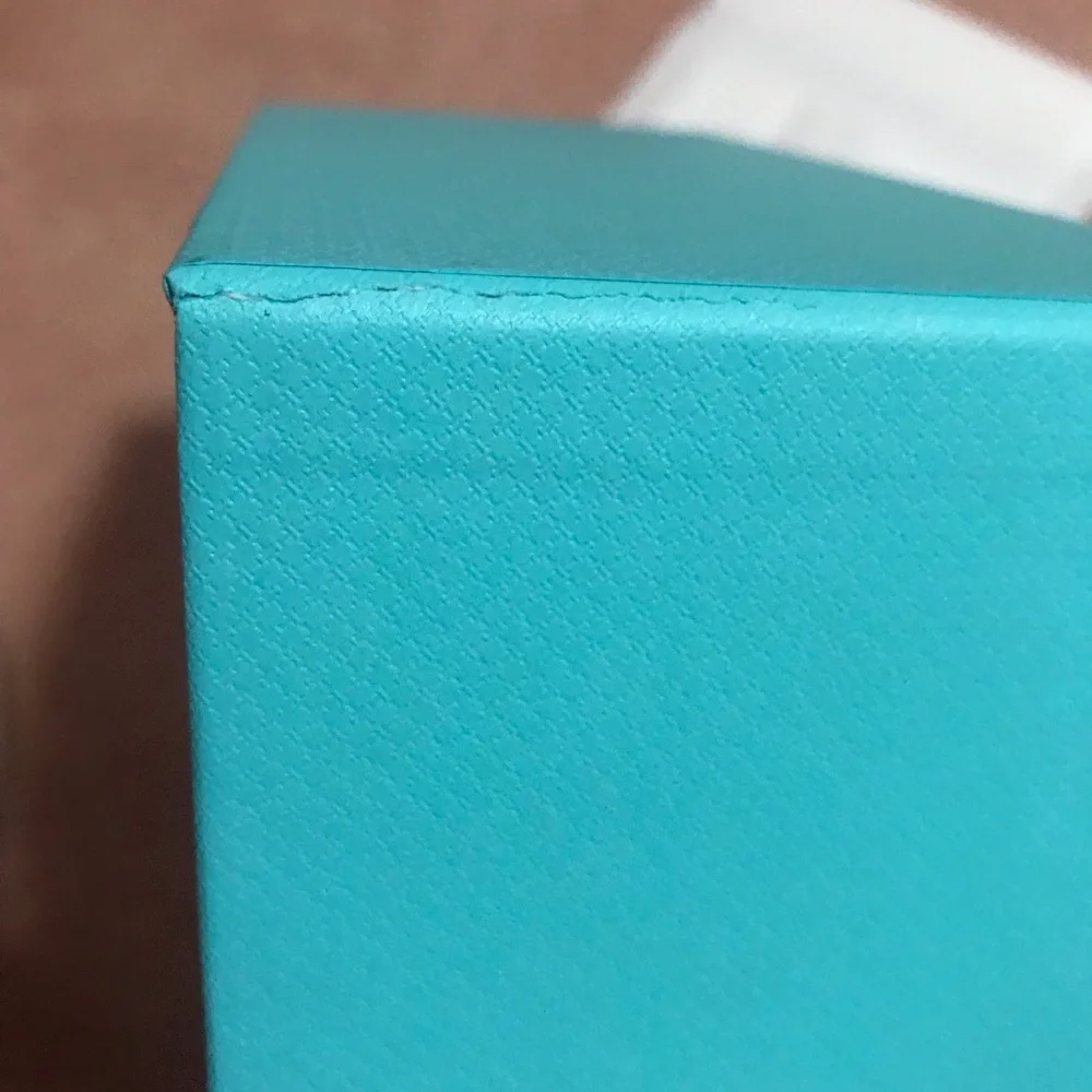 Tiffany box in very good condition plus a small bag of